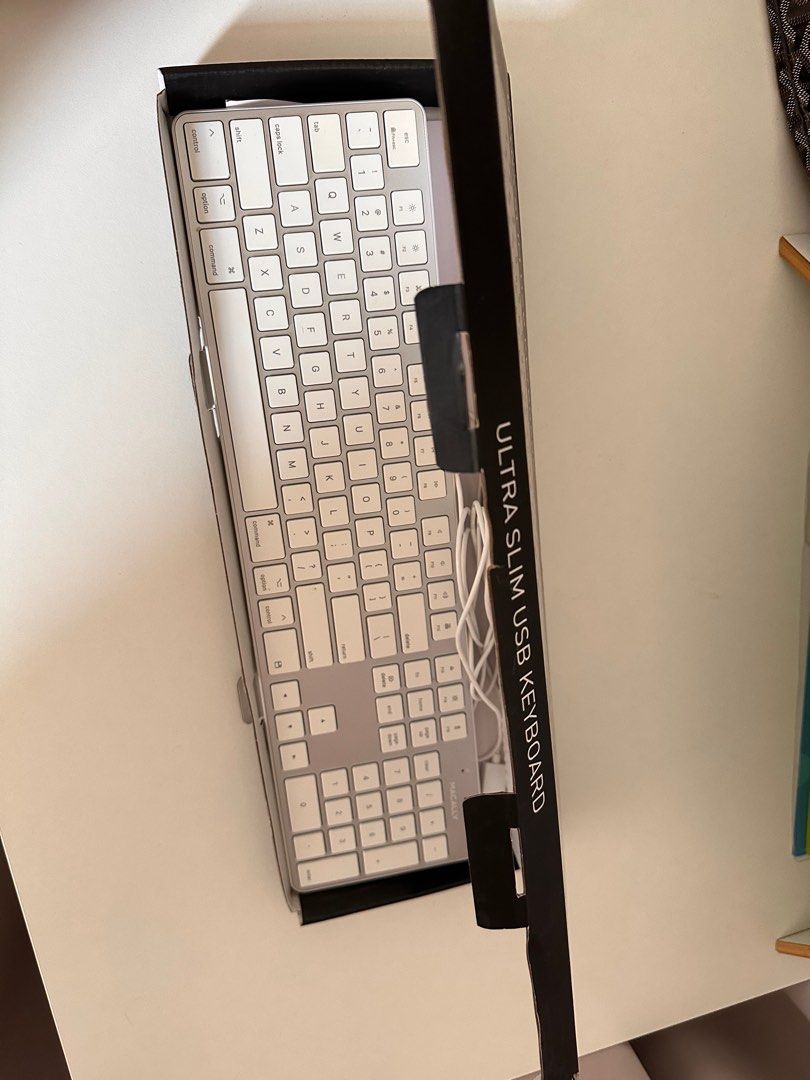 Macally Ultra Slim USB Keyboard (Category: Computer Keyboard) located in Singapore. Submitted by magicbeans (Listing ID 1378010231, Image 2). Description: Brand new Macally Ultra Slim USB Keyboard. Comes with original packaging and USB cable. Perfect for anyone looking for a sleek and compact keyboard. Ready to use out of the box. Original price: $80 ish on amazon.