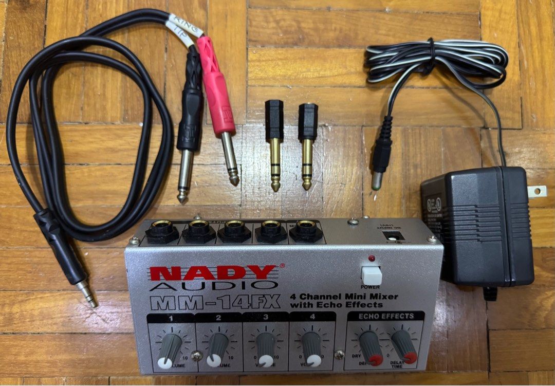 Nady Audio MM-14FX 4-Channel Mixer + Echo [SET] (Category: Other Audio Equipment) located in Singapore. Submitted by poppy_love (Listing ID 1378062748, Image 1). Description: Selling as a set: - Nady Audio MM-14FX 4-Channel Mini Mixer w/ Integrated Echo Effects (depth & delay time). (Original price ~$56) - Hosa CMP-159 Stereo Breakout Cable (3.5mm TRS to Dual 1/4” TRS). (Original price ~$24) - 2x: Gold-Plated Audio Adapters (1/4” TRS to 3.5mm TRS