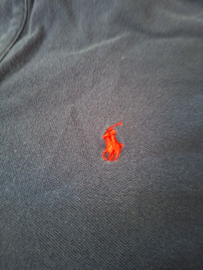 Polo Ralph Lauren Classic Fit Polo Shirt (Category: Tshirts & Polo Shirts) located in Singapore. Submitted by maximillianyeo1 (Listing ID 1378038787, Image 2). Description: - Polo Ralph Lauren polo shirt - Color: Blue - Features iconic red polo player logo - Size: M - Condition: Good (signs of wear) - Ideal for casual wear.