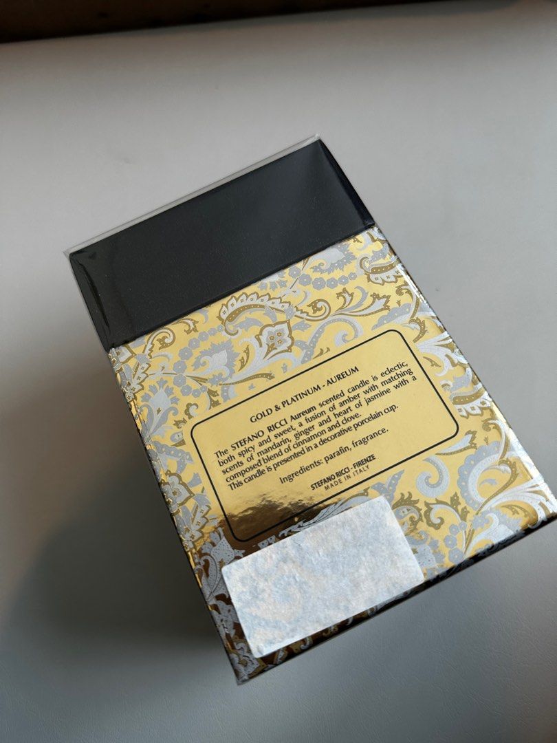 STEFANO RICCI Aureum scented candle (Category: Home Fragrance) located in Quezon City. Submitted by tin.a.a (Listing ID 1377994918, Image 3). Description: SRP in Stefano Ricci in Solaire is around 15k With paper bag The Gold & Platinum decorative porcelain cup has a gold base and is decorated with two types of gold, both matt and shiny, and 98% pure platinum; its design is inspired by the iconic SR Cashmere motif. The STEFANO RICCI Aureum scented