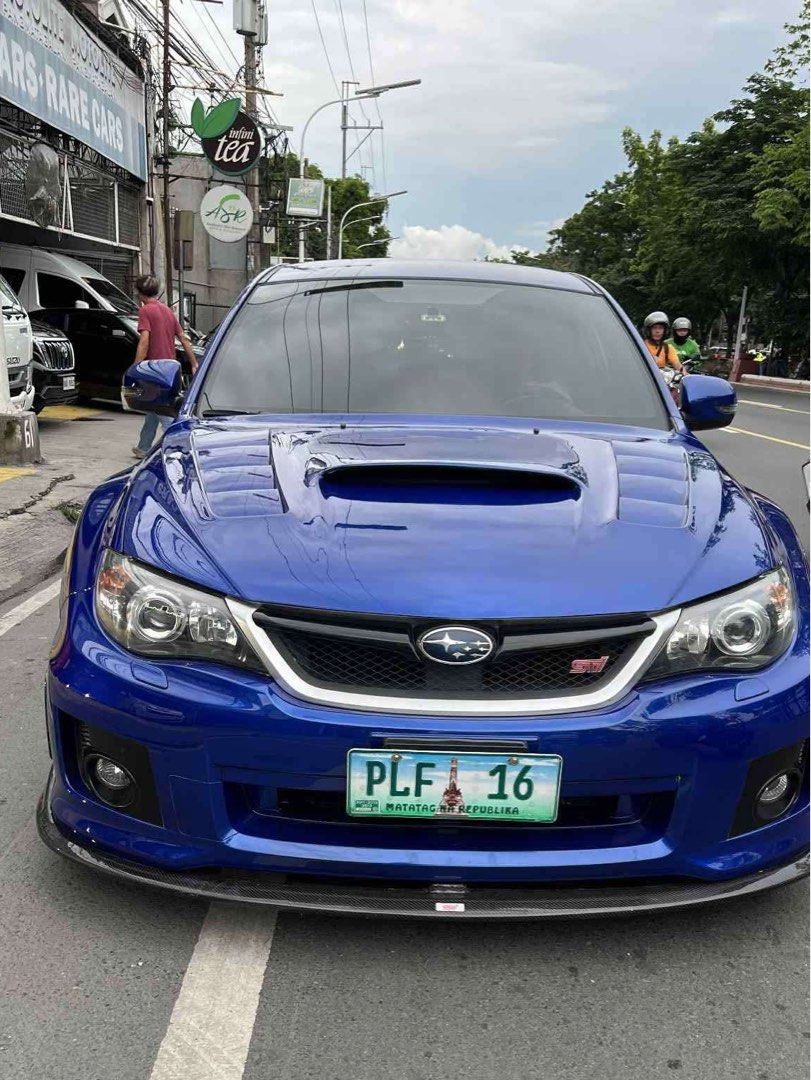 Subaru WRX STI Loaded Auto (Category: Used Cars) located in Manila. Submitted by quality_cars (Listing ID 1378139160, Image 2). Description: For sale‼️ 2011 Subaru WRX STI LOADED TE37 orig mags Bnew Michelin tires HKS Full Exhaust BLITZ Intake Fiber Hood sacrifice sale 50tkm only Price: 1.178m only 📍Tandang sora qc.