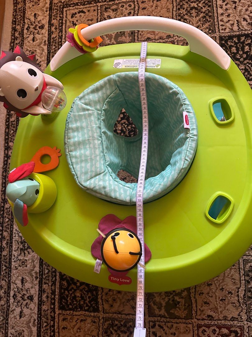 Tiny Love 4-in-1 Here I Grow Mobile Activity Center (Category: Infant Playtime) located in Singapore. Submitted by azimona (Listing ID 1378093830, Image 2). Description: - Tiny Love activity center - 4 modes: swivel, push, bounce, walk - Features various toys - Padded seat for comfort - Excellent condition.