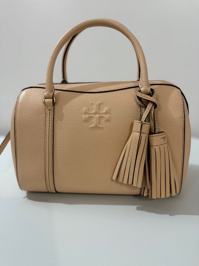 Tory Burch Thea Mini Satchel Crossbody (Category: Luxury Bags & Wallets) located in Makati City. Submitted by simplecloset_24 (Listing ID 1378096489, Image 1). Description: - Almost New - 2 Straps - Coy Pink Color .