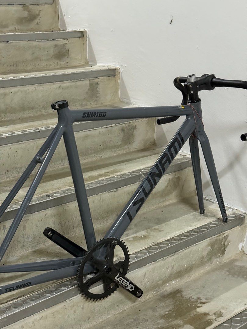 Tsunami SNM100 Frameset (Category: Bicycles) located in Singapore. Submitted by treasu7er (Listing ID 1378042521, Image 3). Description: frame in good condition. Includes frame, fork, headset, stem, dropbar and legend crankset. Strictly no nego , already selling cheap .