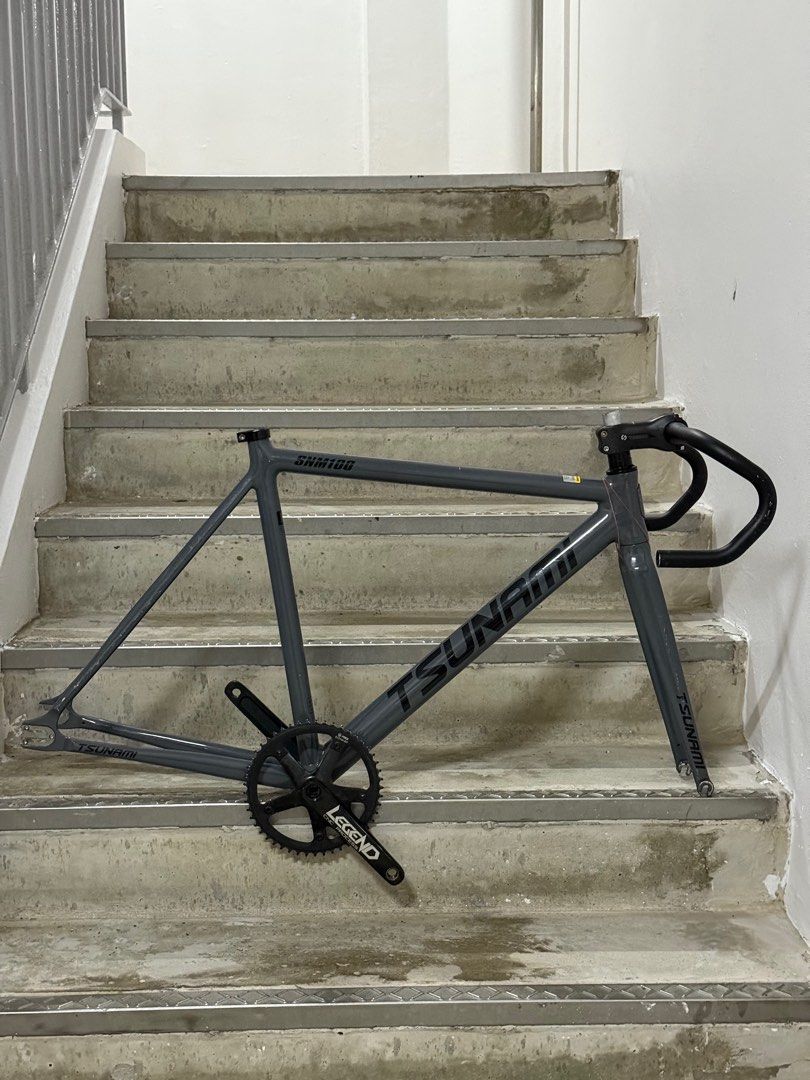 Tsunami SNM100 Frameset (Category: Bicycles) located in Singapore. Submitted by treasu7er (Listing ID 1378042521, Image 1). Description: frame in good condition. Includes frame, fork, headset, stem, dropbar and legend crankset. Strictly no nego , already selling cheap .