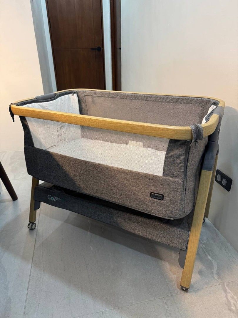 TUTTI BAMBINI COZEE AIR BEDSIDE CRIB (Category: Cots & Cribs) located in Pasig City. Submitted by declutterwithmatt (Listing ID 1378098591, Image 1). Description: Very lightly used. Already comes with FREE 2 sheets (worth 1,950) and foam mattress..