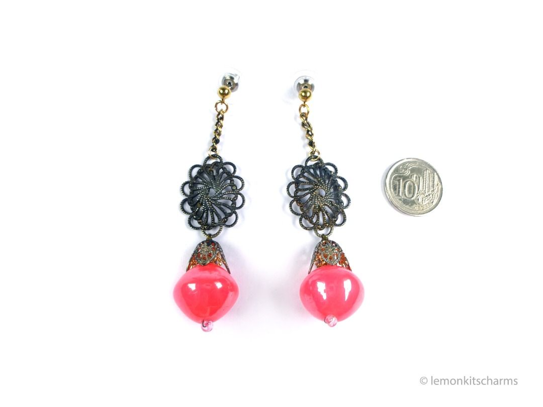 Vintage 1960s Neon Pink Dangle Pierced Earrings, er2661-ci (Category: Earrings) located in Singapore. Submitted by lemonkitscharms (Listing ID 1378077630, Image 3). Description: Vintage 1960s Neon Pink Dangle Earrings, the top pierced posts and clutches are new old vintage stock (these were originally on clips). Very good condition. Ox-brass filigree with wired dangle made of laminated neon pink plastic beads. There is an antiqued-goldtone chain 
