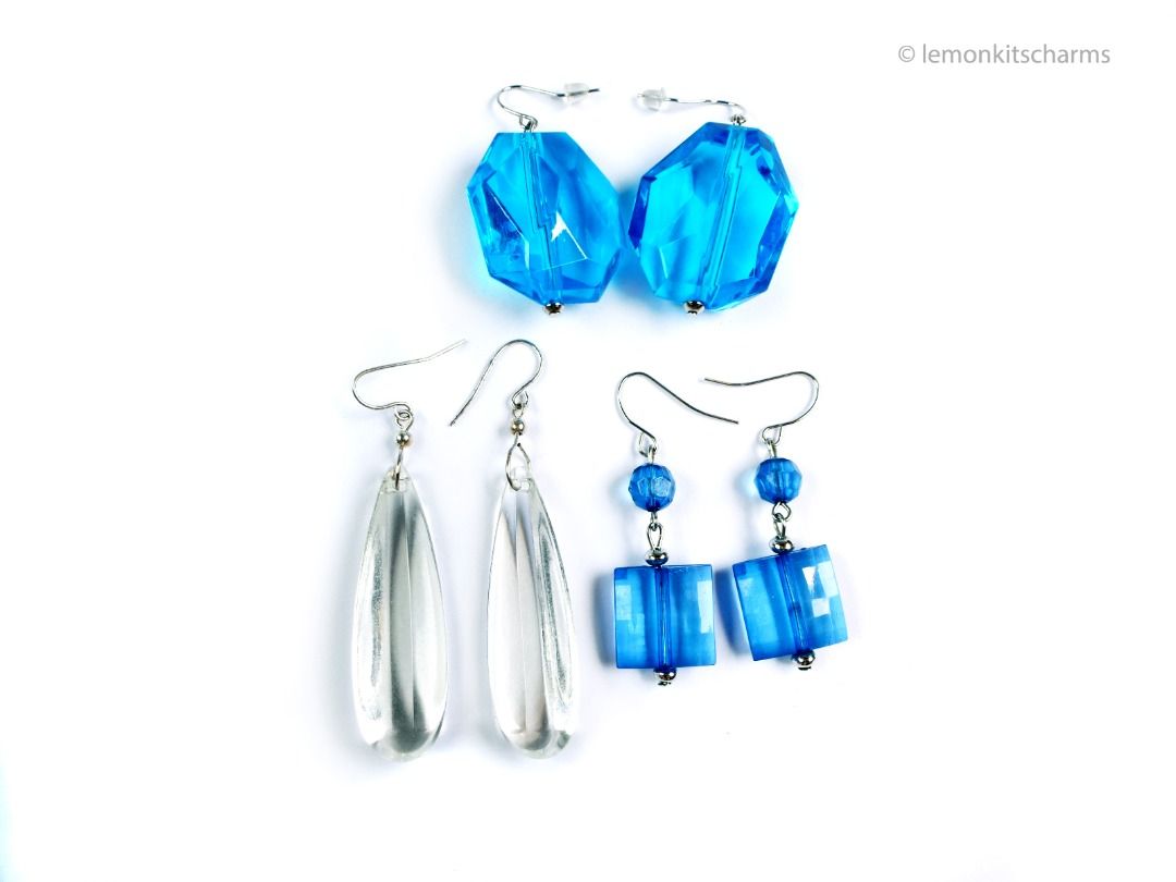 Vintage Blue & Clear Plastic Lucite Pierced Earrings 3pc, er2664-ci (Category: Earrings) located in Singapore. Submitted by lemonkitscharms (Listing ID 1378079108, Image 1). Description: Vintage 1990s - Y2K Blue & Clear Plastic Lucite Earrings, sellling as a lot. All hooks for pierced ears. The blue square one has crackle lines within and dulling on surface. The clear drop ones have dulling & scuffs on surface but still nice when worn. The chunky