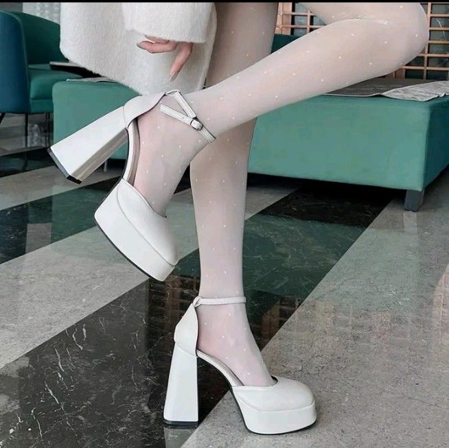 White block heels (Category: Heels) located in Cavite. Submitted by everythingwonn_ (Listing ID 1378000659, Image 1). Description: Only used when fitting size 7.