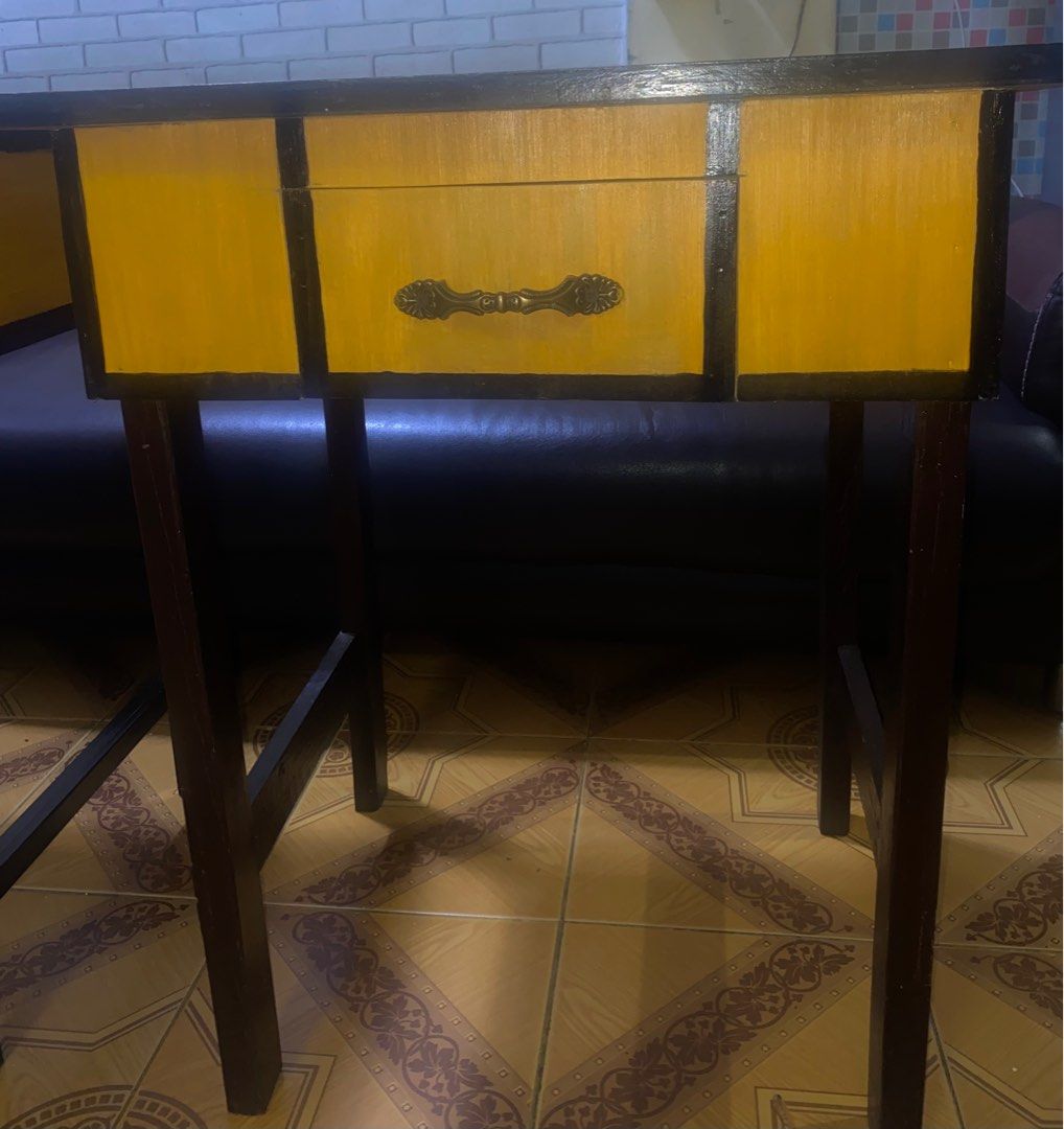 Wooden Side Table / Bedside Table / Small Work Desk (Category: Tables & Sets) located in Quezon City. Submitted by kali.rrr2 (Listing ID 1378077588, Image 3). Description: 📏 Size: 20in (W) x 24in (L) x 29in (H) 💰 Price: ₱1,600 Features: ✅ Made fully from quality wood – durable and long-lasting ✅ Smooth, polished finish for a clean look ✅ Spacious drawer with vintage-inspired handle ✅ Solid and stable structure, built with precision ✅ Versatile 