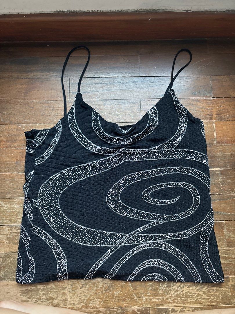 y2k glittery spag top (Category: Sleeveless) located in Singapore. Submitted by orientandco (Listing ID 1378052893, Image 1). Description: super cute, thrifted in amsterdam very stretchy, can fit M to XL things to note - some loose thread (not noticeable cause black on black) -straps a little long .