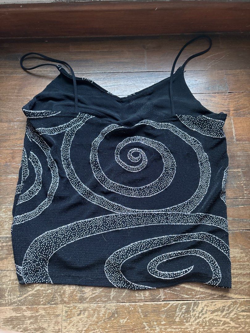 y2k glittery spag top (Category: Sleeveless) located in Singapore. Submitted by orientandco (Listing ID 1378052893, Image 2). Description: super cute, thrifted in amsterdam very stretchy, can fit M to XL things to note - some loose thread (not noticeable cause black on black) -straps a little long .