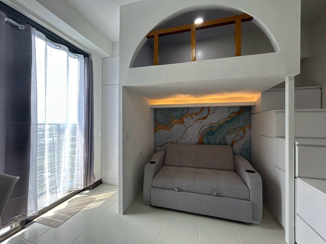 Zadia Tower 2 (Category: Apartments & Condos) located in Binan City. Submitted by swiftcrystal_fe0be5 (Listing ID 1378006825, Image 1). Description: Spacious fully furnished condo near LTI, DLSU, Xavier School, Nuvali and many more! Located at the heart of Greenfield City, where you can work, relax and feel the greenery of this newly developed property. For a convenient rental experience, this unit includes: Sofa bed Double size bed 55" Televisio