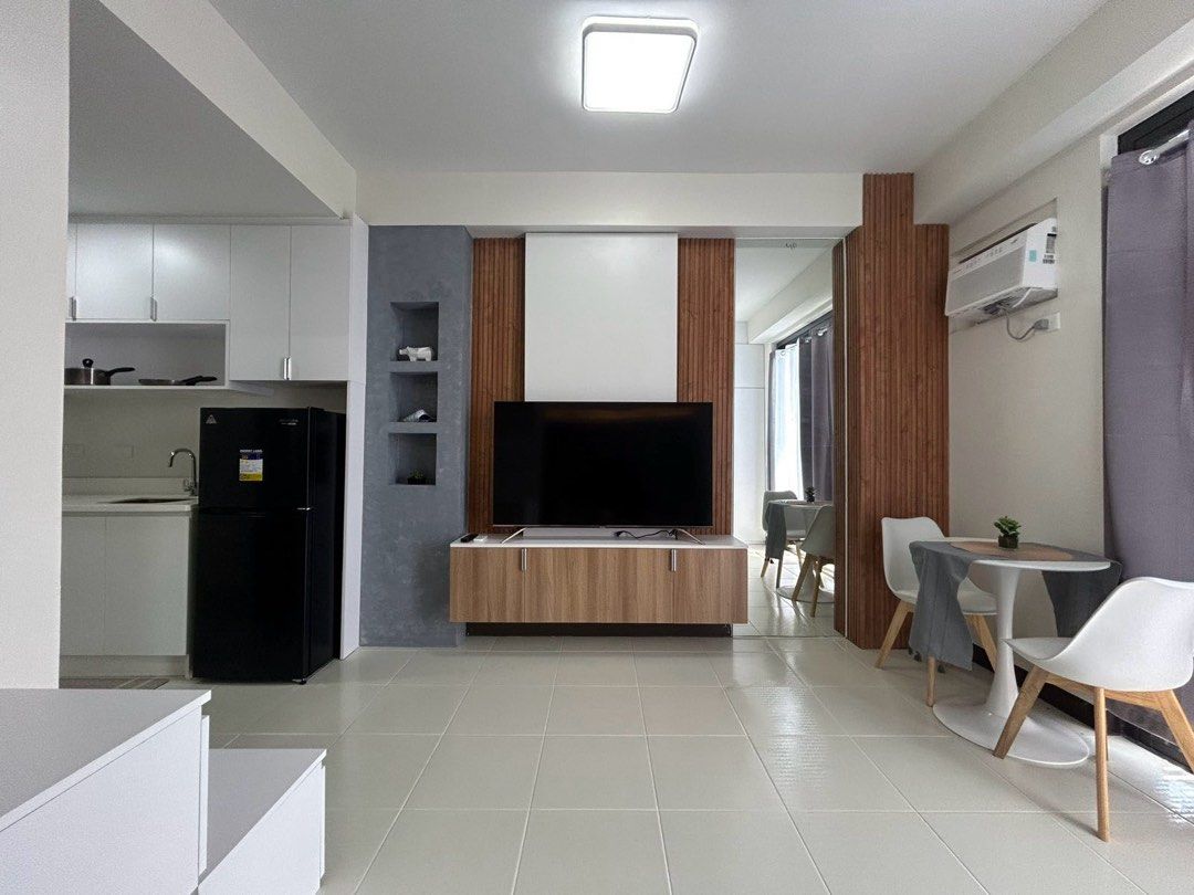 Zadia Tower 2 (Category: Apartments & Condos) located in Binan City. Submitted by swiftcrystal_fe0be5 (Listing ID 1378006825, Image 3). Description: Spacious fully furnished condo near LTI, DLSU, Xavier School, Nuvali and many more! Located at the heart of Greenfield City, where you can work, relax and feel the greenery of this newly developed property. For a convenient rental experience, this unit includes: Sofa bed Double size bed 55" Televisio