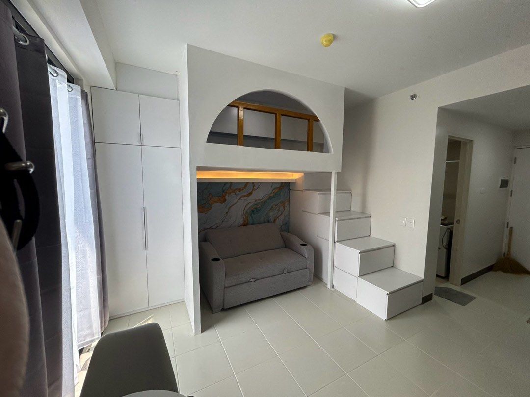 Zadia Tower 2 (Category: Apartments & Condos) located in Binan City. Submitted by swiftcrystal_fe0be5 (Listing ID 1378006825, Image 2). Description: Spacious fully furnished condo near LTI, DLSU, Xavier School, Nuvali and many more! Located at the heart of Greenfield City, where you can work, relax and feel the greenery of this newly developed property. For a convenient rental experience, this unit includes: Sofa bed Double size bed 55" Televisio