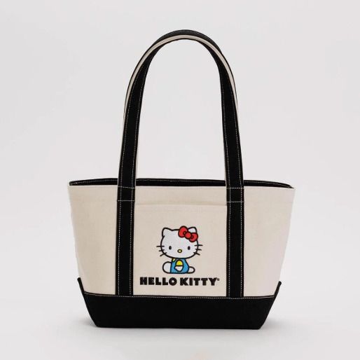 Baggu X Hello Kitty small heavyweight canvas bag (Category: Tote Bags) located in Quezon City. Submitted by oli_g (Listing ID 1379830704, Image 3). Description: Size: 24cm × 39cm × 15cm Materials: 100% cotton canvas - A quintessential and versatile tote, perfectly sized to carry in hand or over the shoulder. - Nice thick canvas that's easy to clean - Exterior front pocket - 10" top carry handles - Two handles and 101cm adjustable strap - Can carr