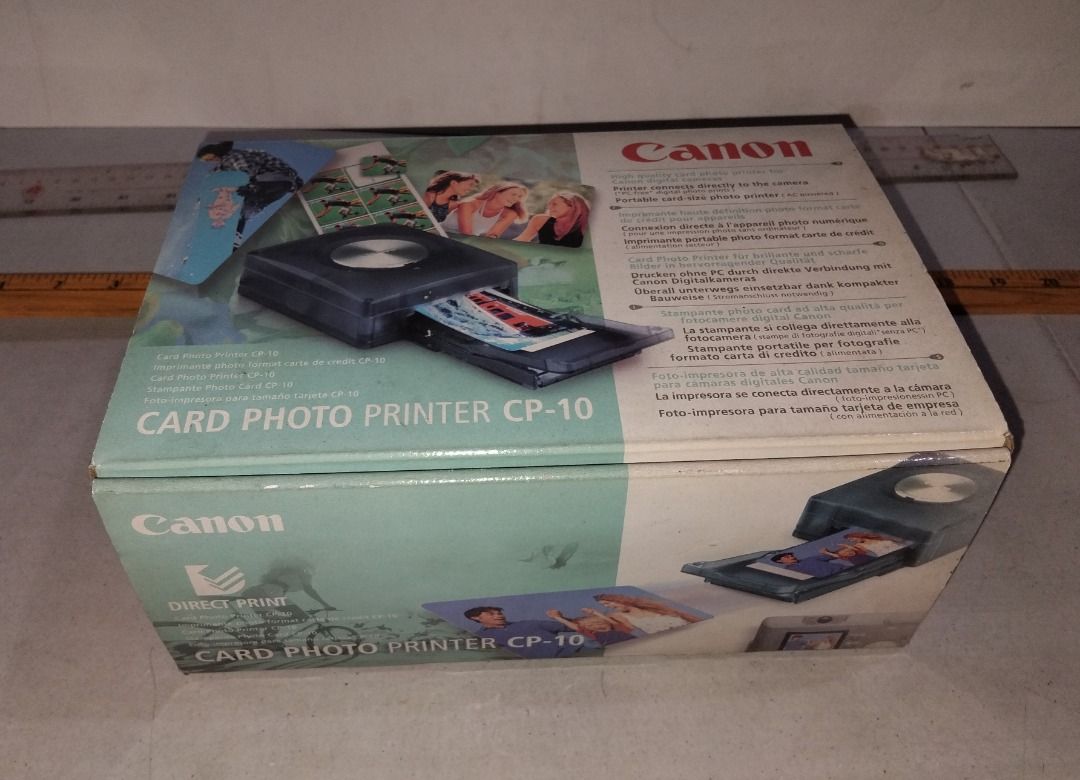 Canon Card Photo Printer CP-10 (Category: Printers, Scanners & Copiers) located in Marikina City. Submitted by my-an (Listing ID 1379804977, Image 1). Description: Canon Card Photo Printer CP-10 Made in Japan As Is. Never used, open box. With user guide/manual. Connects directly to camera. Minimal testing done, unit was plugged and the power light turned-on with printer start sound. Please see pictures. Got this as pasalubong/gift but was not abl