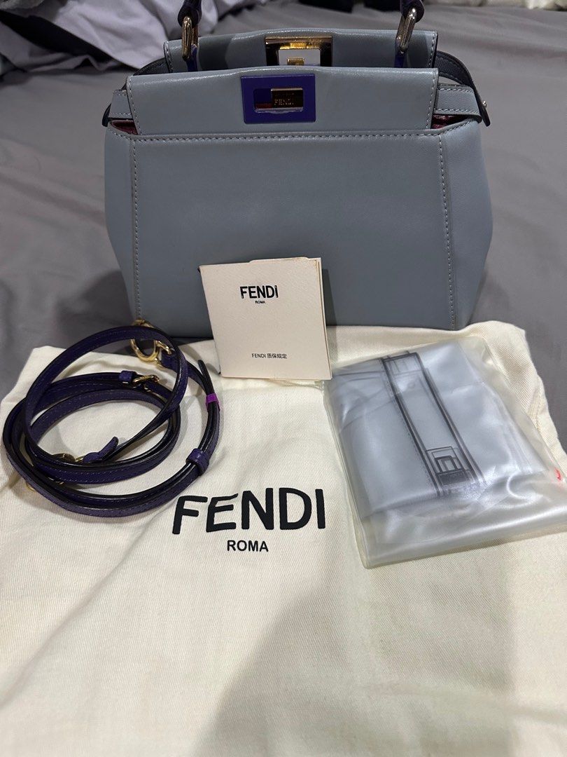Fendi Peekaboo Mini (Category: Luxury Bags & Wallets) located in Makati City. Submitted by rnathaliem (Listing ID 1379741910, Image 1). Description: Fendi Peekaboo Mini Size Width 23cm, height 18cm,depth 12cm With strap Dustbag Authenticity card Bag raincoat.