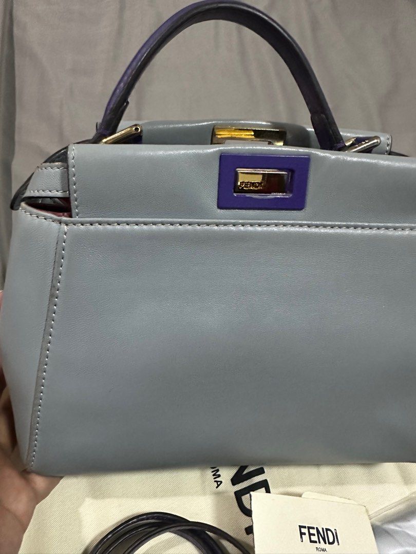 Fendi Peekaboo Mini (Category: Luxury Bags & Wallets) located in Makati City. Submitted by rnathaliem (Listing ID 1379741910, Image 2). Description: Fendi Peekaboo Mini Size Width 23cm, height 18cm,depth 12cm With strap Dustbag Authenticity card Bag raincoat.