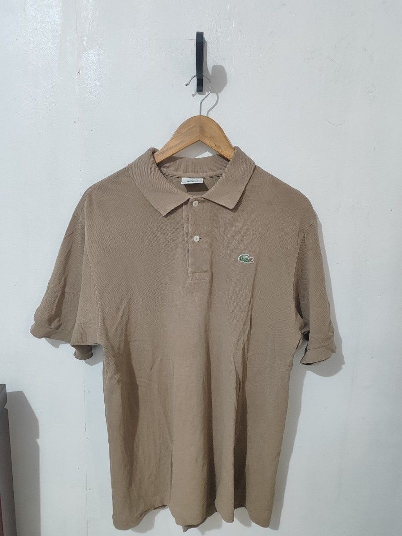 Lacoste Brown Polo Shirt (Category: Tshirts & Polo Shirts ) located in Manila. Submitted by ksayson (Listing ID 1379722831, Image 1). Description: Dimes: 21x28.5 Size on Tag: Size 5 Color Rate; 9/10 Issue: Restitch, fake Price: 150 Location: Manila Decluterring.