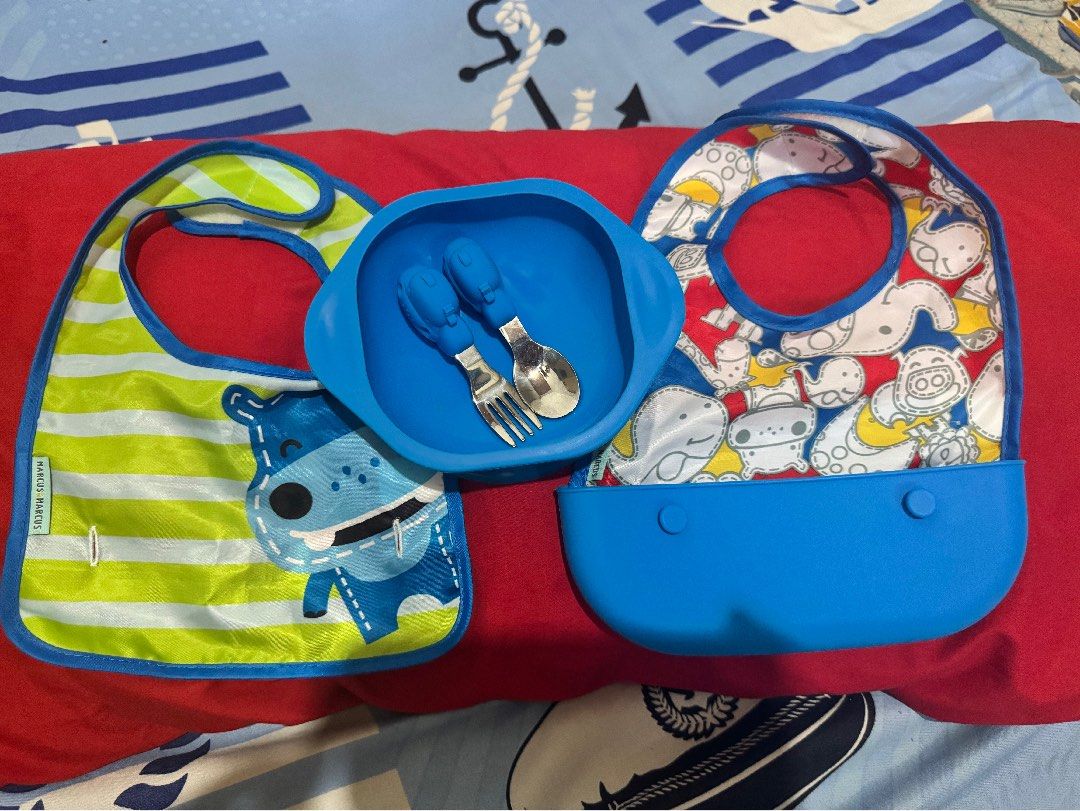 MARCUS & MARCUS BOWL & BIB (Category: Weaning & Toddler Feeding) located in Malabon City. Submitted by preloveddesigners (Listing ID 1379821734, Image 1). Description: For take all! Original Marcus & Marcus suction bowl with spoon and fork. Silicone bib with extra cloth. Kindly see flaw on the bib..
