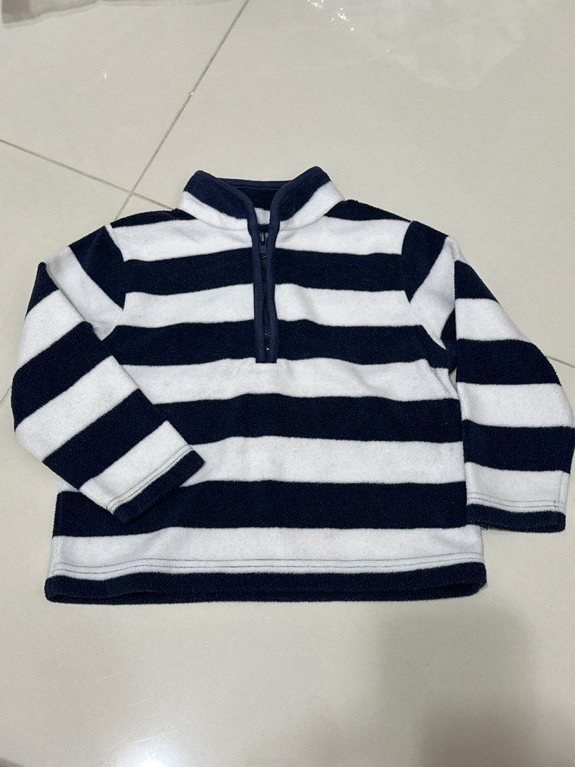 Mothercare Fleece Sweater 9-12 Months (Category: Babies & Kids Fashion) located in Singapore. Submitted by jean.eustacia (Listing ID 1379871237, Image 1). Description: Mothercare fleece sweater in navy and white stripes. Colour true to 2nd picture. Features a half-zip closure. Tagged size for babies aged 9-12 months but can fit up to 2yo. Wash but not worn. In good condition. .