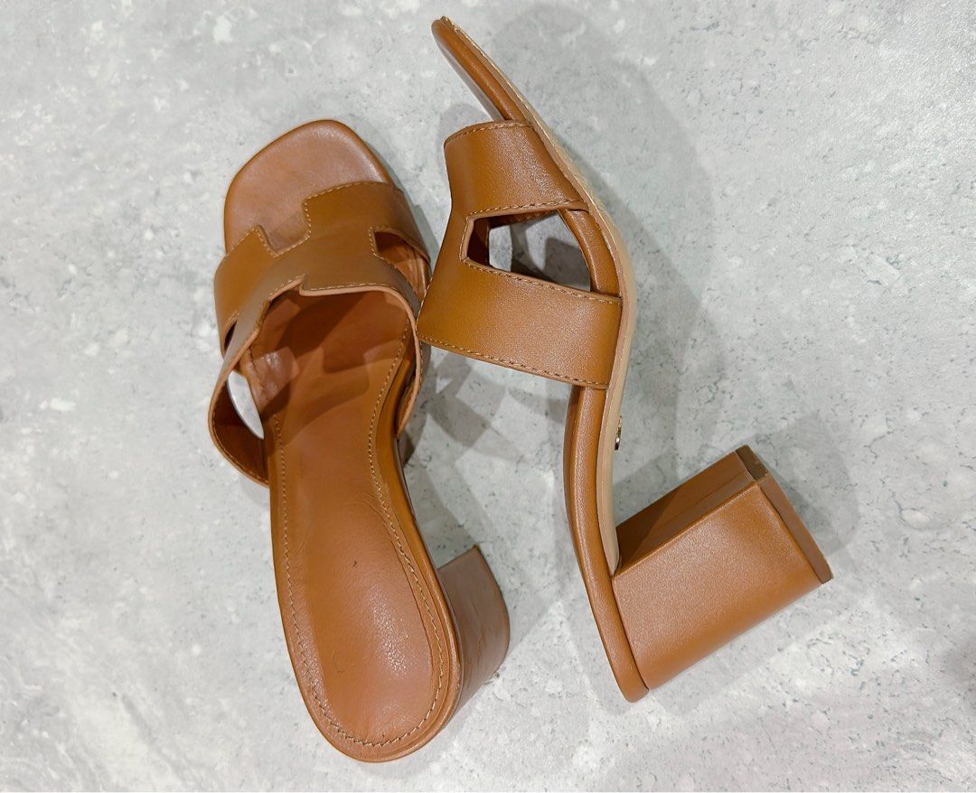 Novo FRANCINE CARAMEL OPEN TOE HEELS size AU7 (Category: Women's Shoes) located in Miranda. Submitted by abbie.corner (Listing ID 1379878899, Image 3). Description: Pre-loved, used in good condition Some scuff and marks at the back Open square toe - Block heels - Leather look upper - Slip-on style - Heel height: 7cm - PETA approved VEGAN #novoshoes #Hletter #Hshoes #blockheels #preloved.