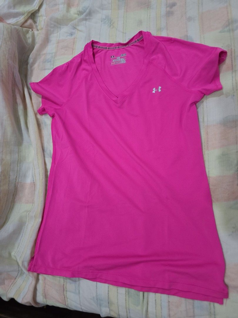 Original Under Armour Hot Pink Active Shirt (Category: Activewear) located in San Juan City. Submitted by caragig (Listing ID 1379886010, Image 1). Description: Brand: Under Armour original Color: Hot Pink Size: Small Type: active wear, heat gear model, sweat evaporates quickly Design: v-neck, slim fit Condition: lightly used, still in very good condition, color is still vibrant, logo is not yet faded Measurement: Chest: 17. 5 inches Waist: 17. 7