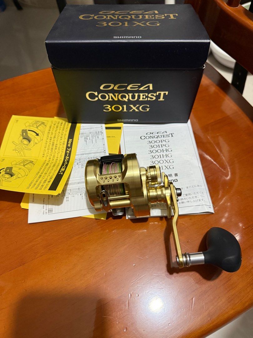 SHIMANO OCEA CONQUEST 301XG（右手攪), 運動產品, 釣魚- Carousell