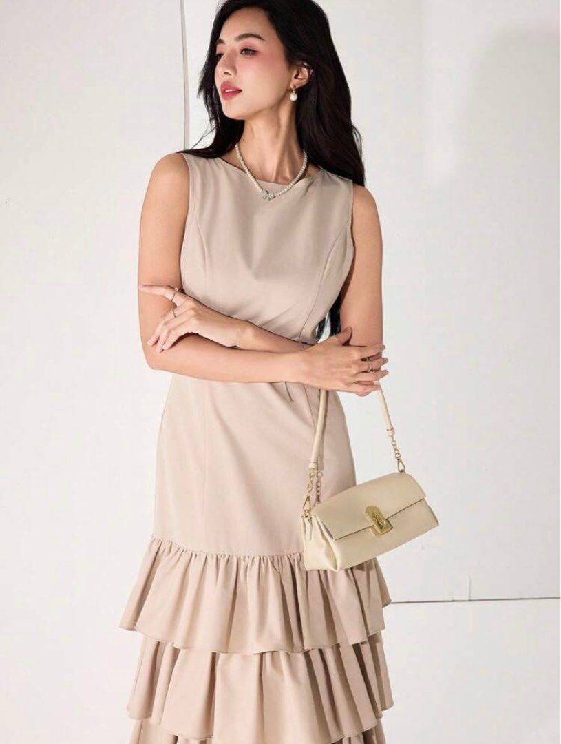 Sleeveless Long Dress With Ruffle Hem, 2-Layer Design (Category: Dresses) located in Manila. Submitted by jes_ssi (Listing ID 1379796325, Image 1). Description: ⤷ Used once ⤷ This is the actual color and picture ⤷ L on tag ⤷ Can fit to M - L size frame. ⤷ Fixed price ⤷ SF shouldered by buyer. (Lalamove/Grab Express mode of courier only).