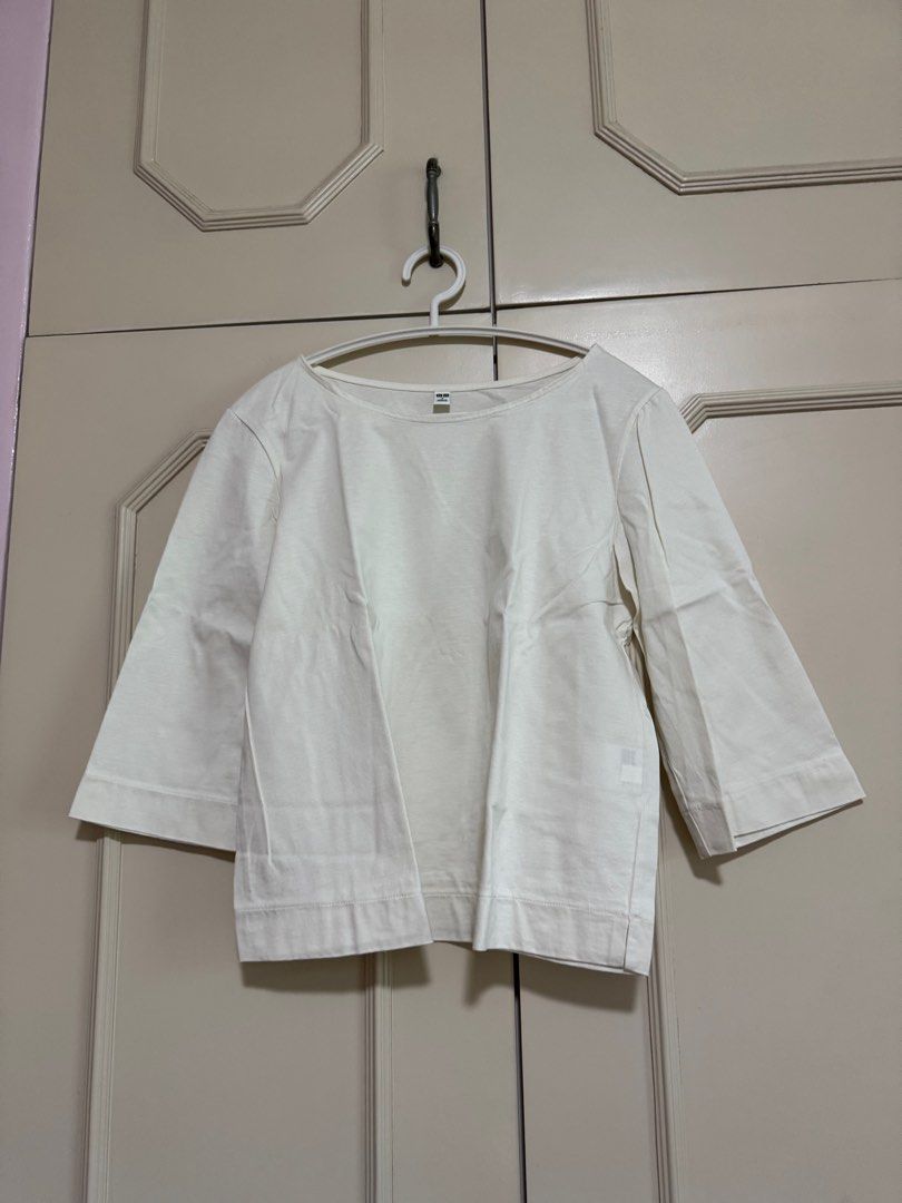 Uniqlo white 3/4 sleeve top (Category: Shirts) located in Paranaque City. Submitted by declutter.finds (Listing ID 1379771534, Image 1). Description: PLEASE READ THE DESCRIPTION! *PRICE IS FINAL *LOWBALLERS BLOCKED *NO WHEN WORN - BRAND NEW, never used, no flaws - RFS: too many clothes - sleeves up to elbows - reservation of item upon payment (gcash) .