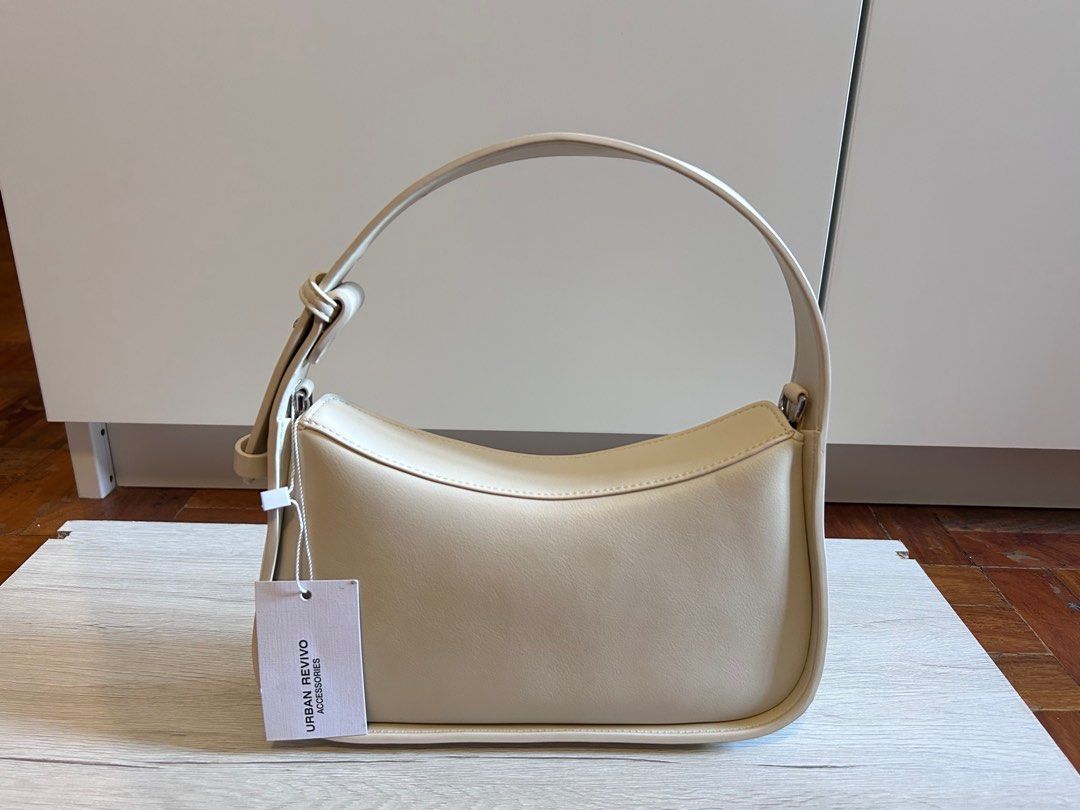 Urban Revivo bag - Off white (Category: Shoulder Bags) located in Manila. Submitted by aspen_ (Listing ID 1379806422, Image 1). Description: Urban Revivo armpit bag in off white color Note: ✅ Price is negotiable ✅ Shipping fee c/o buyer RFS: Decluttering MOP: GCASH For more inquiries, please feel free to message! .