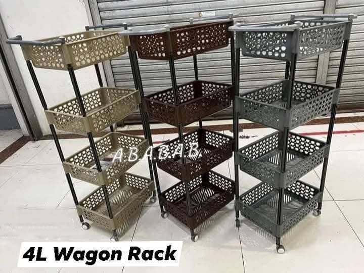 4 Layer Wagon Rack with Wheels (Category: Storage Boxes & Baskets) located in Manila. Submitted by onlineshoppersph (Listing ID 1379998288, Image 2). Description: Cash On Deliver - Metro Manila - Delivery Fee/Handling Fee shouldered by BUYERS - DF/HF depends on BUYERS Location LALAMOVE PICK UP - Cash on Deliver - Metro Manila & Nearby DELIVER THRU COURIER, CARGO & BUS - Provincial Buyers - Payment 1st Thank You.