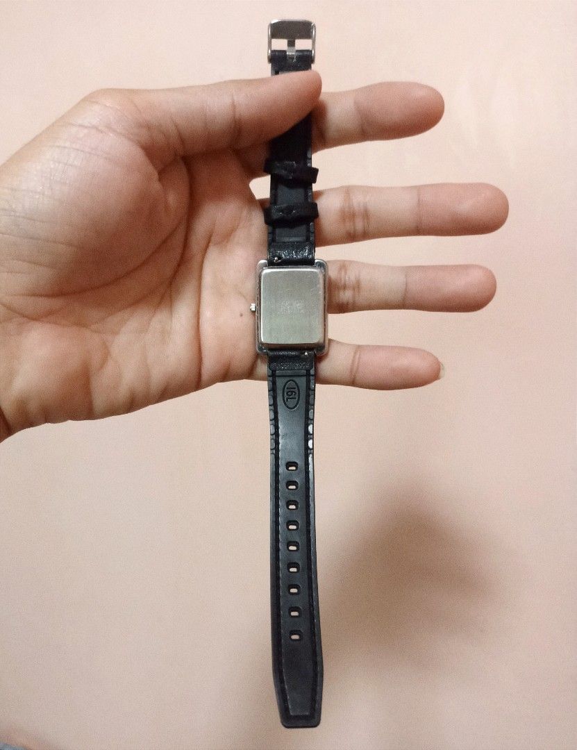 Alpha Cubic japan tank quartz watch (Category: Men's Watches) located in Quezon City. Submitted by 511flips (Listing ID 1379964976, Image 3). Description: 🔹 ALPHA CUBIC Vintage Quartz Watch – Japan Made 🔹 💯 Authentic | Classic Style | Unisex 🕰️ Timeless and elegant, this Alpha Cubic wristwatch features a sleek rectangular stainless steel case with a cream dial and bold black numerals – easy to read and stylishly minimal. ✨ Features: ✔️ Japan 