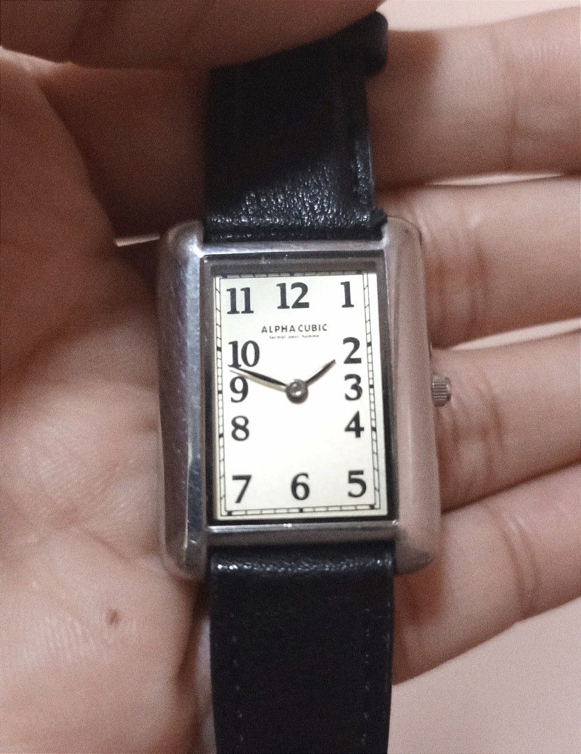 Alpha Cubic japan tank quartz watch (Category: Men's Watches) located in Quezon City. Submitted by 511flips (Listing ID 1379964976, Image 1). Description: 🔹 ALPHA CUBIC Vintage Quartz Watch – Japan Made 🔹 💯 Authentic | Classic Style | Unisex 🕰️ Timeless and elegant, this Alpha Cubic wristwatch features a sleek rectangular stainless steel case with a cream dial and bold black numerals – easy to read and stylishly minimal. ✨ Features: ✔️ Japan 