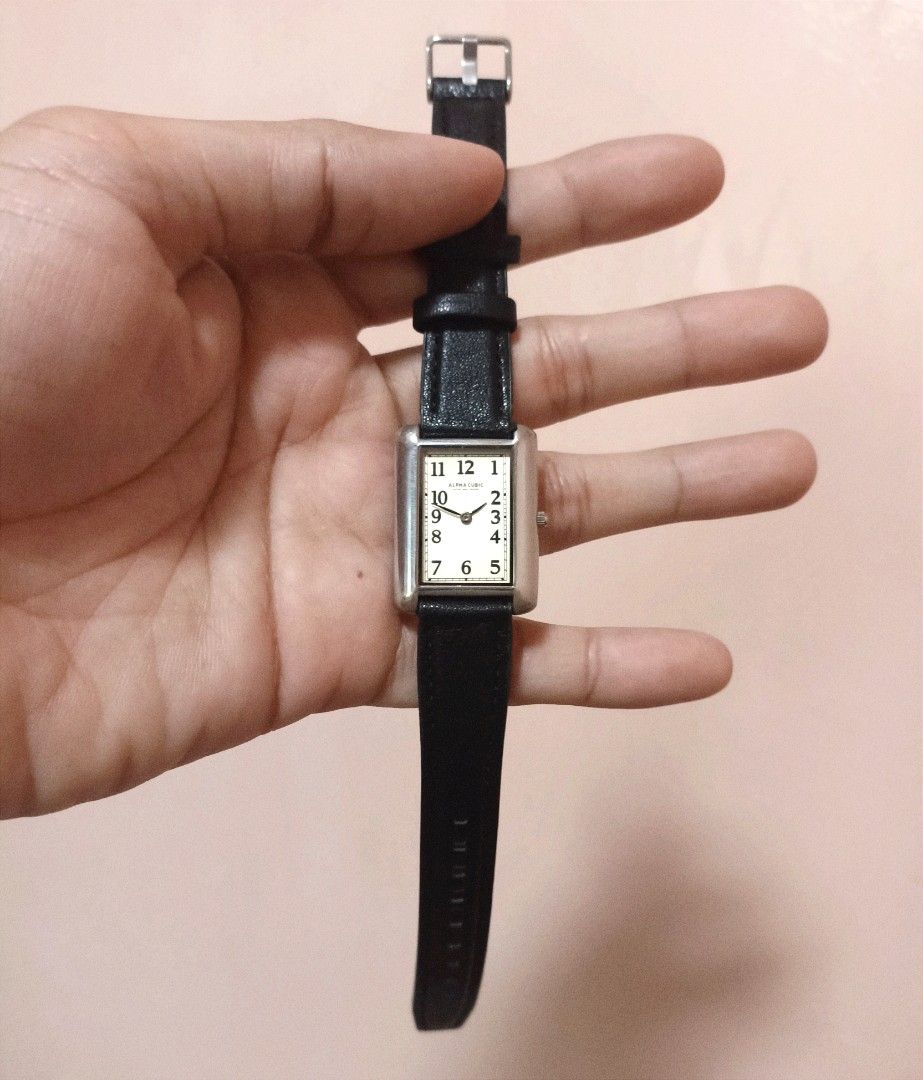 Alpha Cubic japan tank quartz watch (Category: Men's Watches) located in Quezon City. Submitted by 511flips (Listing ID 1379964976, Image 2). Description: 🔹 ALPHA CUBIC Vintage Quartz Watch – Japan Made 🔹 💯 Authentic | Classic Style | Unisex 🕰️ Timeless and elegant, this Alpha Cubic wristwatch features a sleek rectangular stainless steel case with a cream dial and bold black numerals – easy to read and stylishly minimal. ✨ Features: ✔️ Japan 