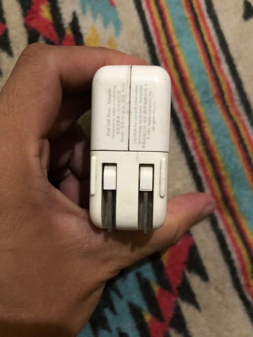 Apple IPOD usb charging adapter (Category: Portable Audio Accessories) located in Quezon City. Submitted by markgolveo (Listing ID 1379953917, Image 3). Description: Apple IPOD usb charging adapter.