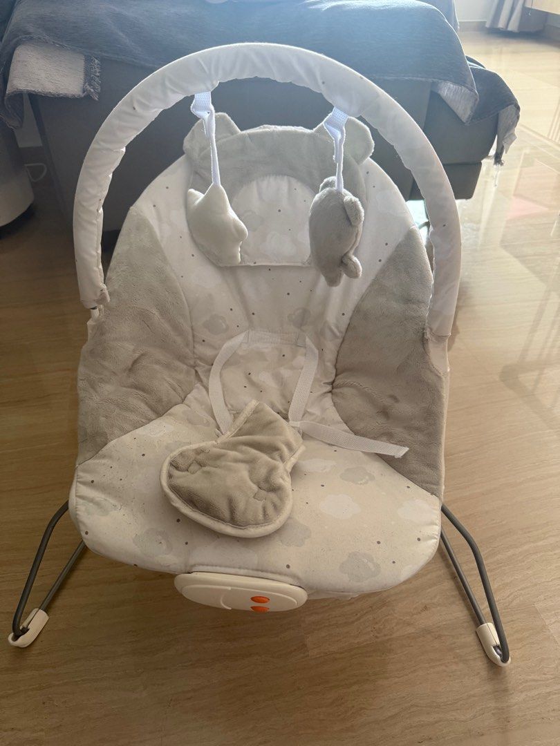 Baby Bouncer with Toys - Grey (Category: Infant Playtime) located in Singapore. Submitted by gerzxz (Listing ID 1379933757, Image 1). Description: Used once when baby was infant but she didn’t like it, so just clearing it. No idea what is the brand as it was a gift from family. Self collect please~ .