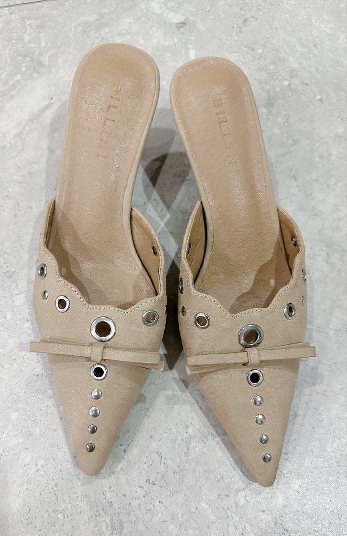 Billini Taupe ELIO SUEDE POINT size AU6 (Category: Women's Shoes) located in Miranda. Submitted by abbie.corner (Listing ID 1379912665, Image 1). Description: Lightly used, in excellent condition Elio is a luxe pointed mule, available exclusively to Billini. Exude contemporary style with a vintage twist with this luxe on-trend pump. Featuring; • mid, kicked in stiletto heel • court style upper with closed pointed toe • luxe scalloped trim • stud 