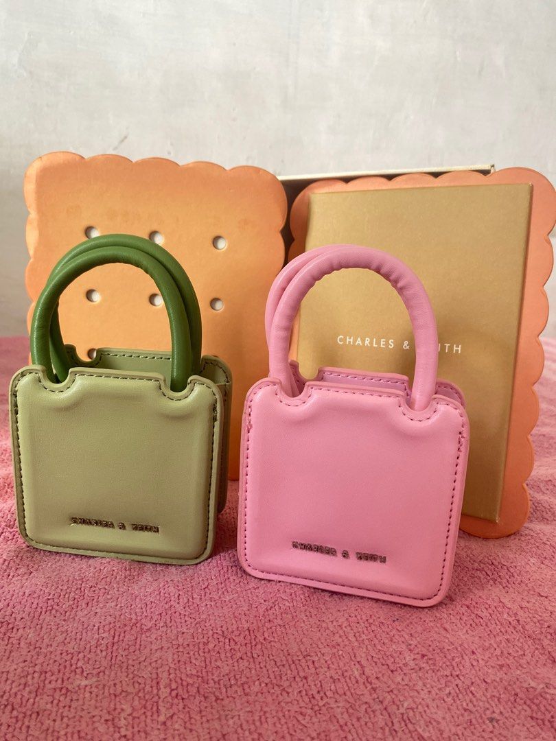 Charles and Keith Micro Perline (Category: Purses & Pouches) located in Rizal. Submitted by 17.righthere (Listing ID 1379955927, Image 1). Description: C&K Micro Perline Sculptural Bag Never been used, tnitigan and keep lng s box 😅 With strap, dust bag, cookie box and tags Available in pink and matcha green.