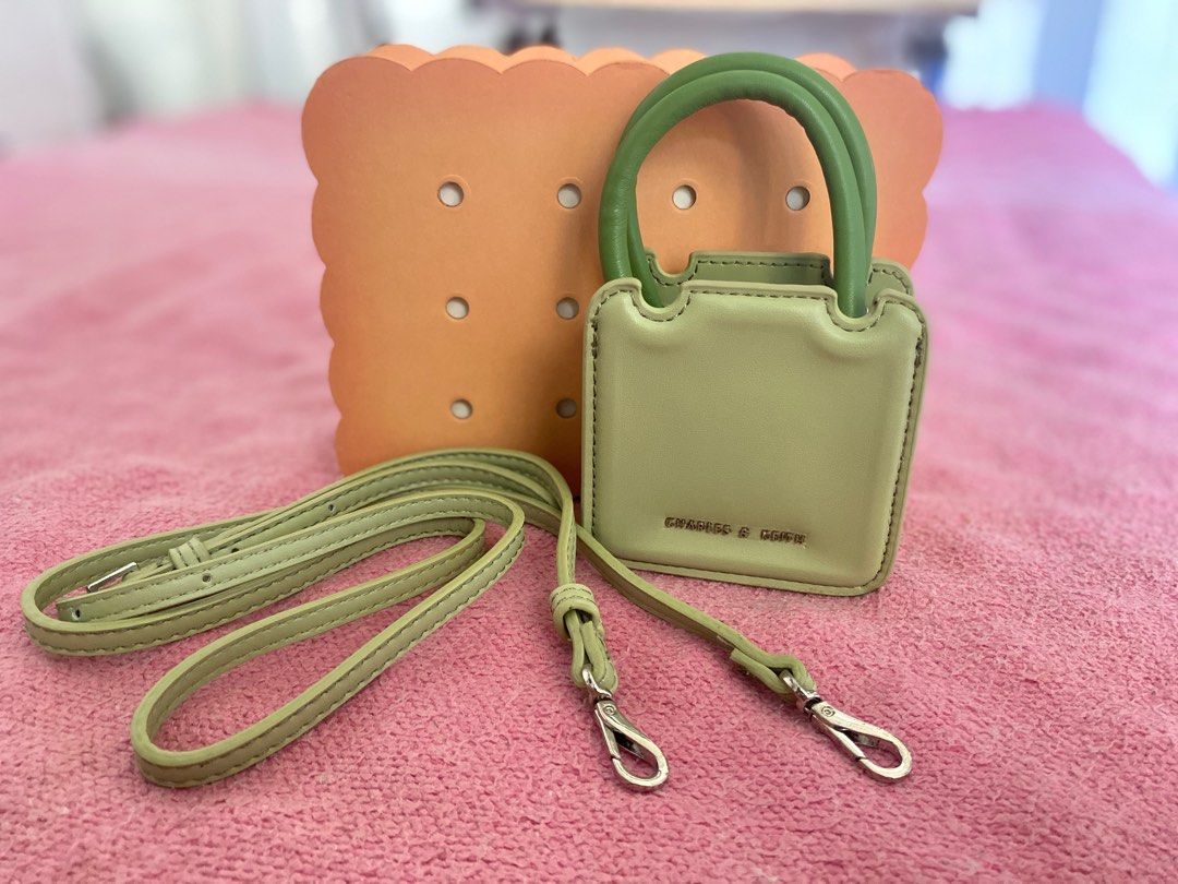 Charles and Keith Micro Perline (Category: Purses & Pouches) located in Rizal. Submitted by 17.righthere (Listing ID 1379955927, Image 2). Description: C&K Micro Perline Sculptural Bag Never been used, tnitigan and keep lng s box 😅 With strap, dust bag, cookie box and tags Available in pink and matcha green.