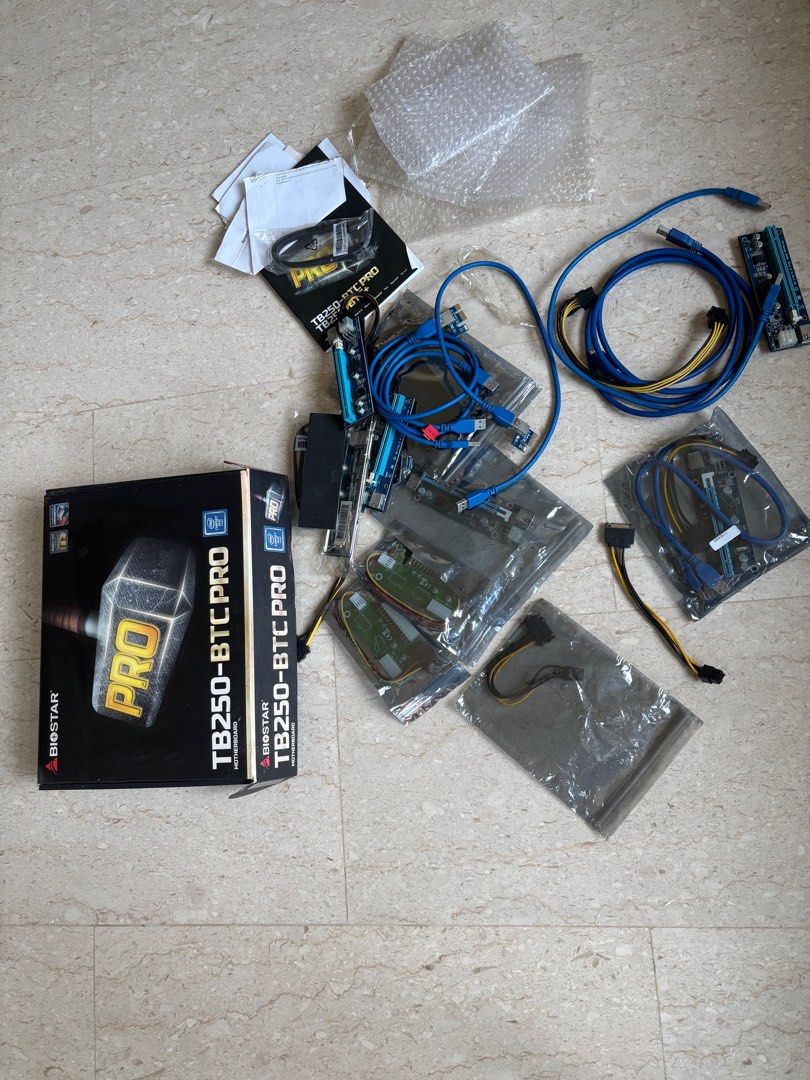 Crypto mining stuff (Category: Computer Parts) located in Singapore. Submitted by thebarney (Listing ID 1380085588, Image 1). Description: gave up mining a few years ago not sure if mobo still working but those pci items in plastic are still new. Selling all as package or trade if you have philodendron or phal. plants.