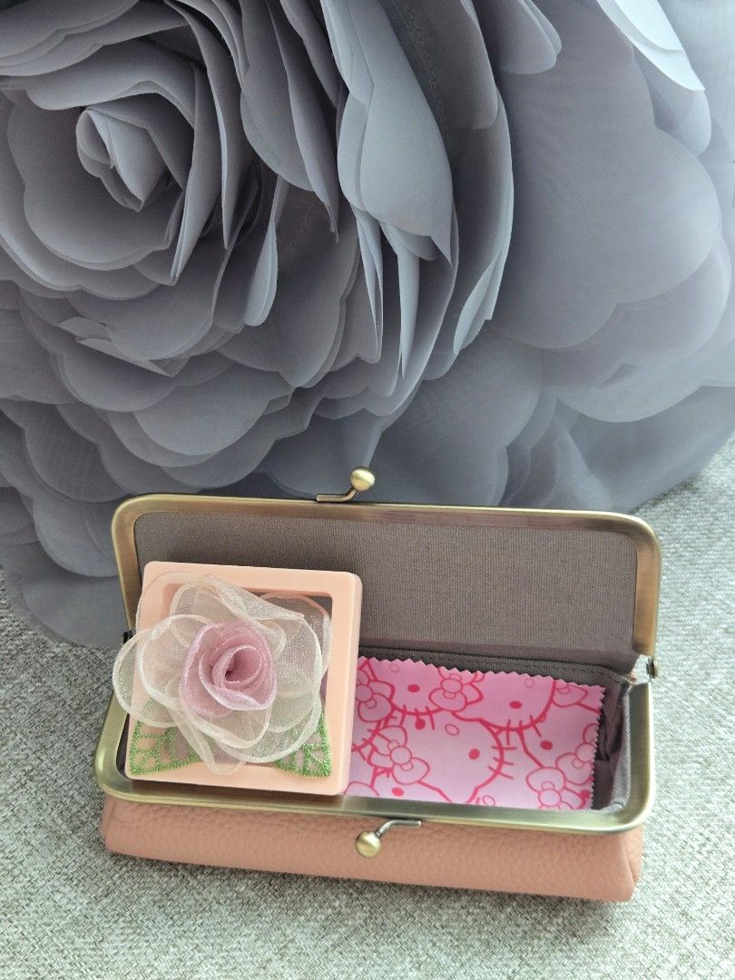 Genuine Pink Leather Multi Purpose Kiss Clasp Pouch - Japan (Category: Purses & Pouches) located in Singapore. Submitted by stargazer69sg (Listing ID 1379611664, Image 1). Description: Brand New in our curated gift box With Hello Kitty Dust Clothe Comes Magnetic Flower Brooch. Genuine Leather in nude pink. Free Track Mail Dimension:.