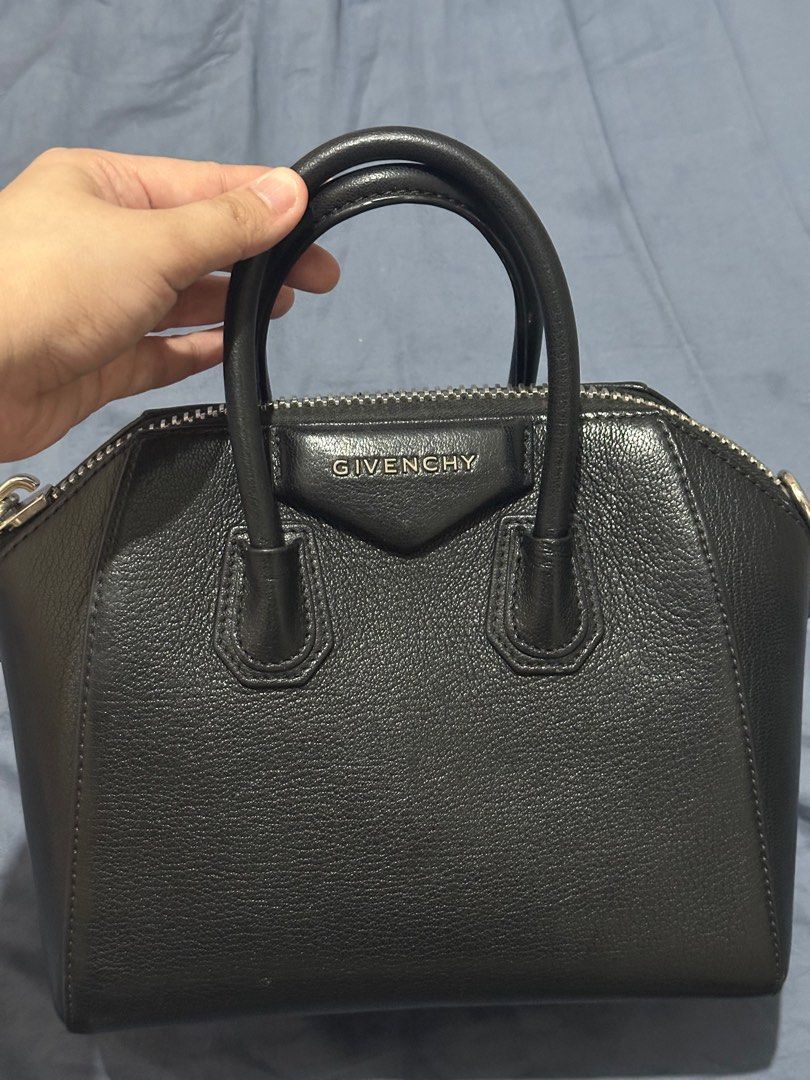Givenchy Mini Antigona Black in Goat skin (Category: Luxury Bags & Wallets) located in Paranaque City. Submitted by paupreloveditems (Listing ID 1380059699, Image 1). Description: Authentic Givenchy Mini Antigona in Black Goats Skin. With booklet, entrupy, and strap. Current retail price is 120k pesos. .