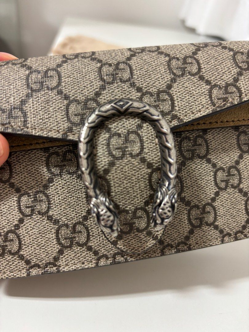 Gucci Dionysus Super Mini Bag (Category: Bags & Wallets) located in Singapore. Submitted by claireteen (Listing ID 1380059892, Image 3). Description: Authentic Gucci Dionysus Super Mini bag. Got it from MBS boutique. Comes with original dust bag and paper bag, no box. The bag - used 3 times only In excellent condition, no signs of wear and tear, no scuffings at the corner. You may ask for more pictures:) Perfect for a night out or to add a touch 