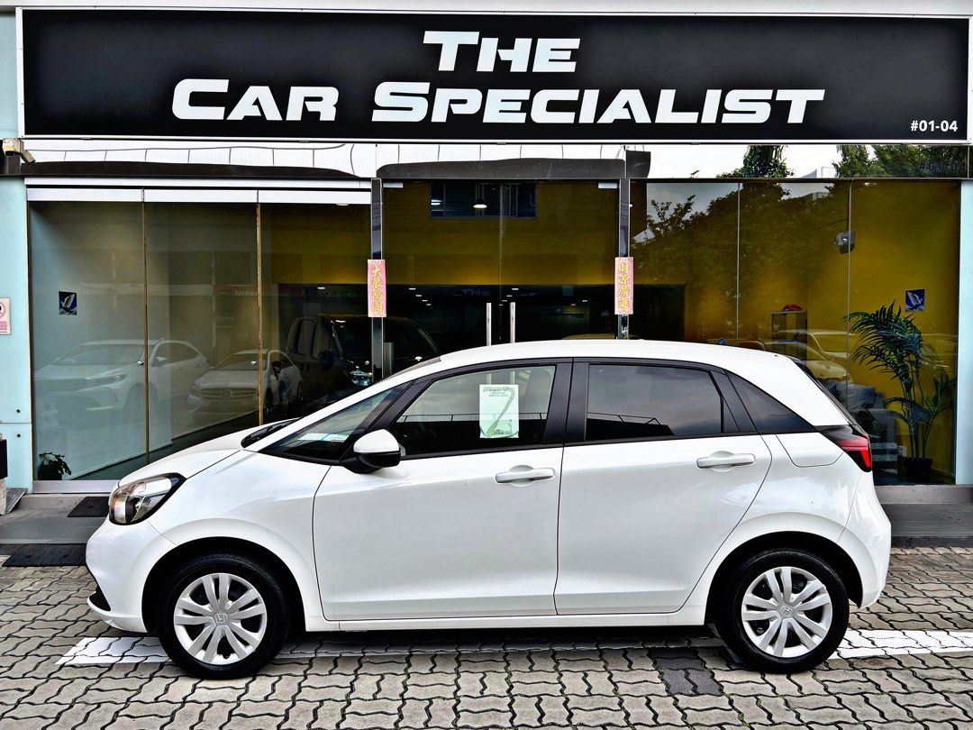 Honda Fit 1.5 GR - 1 Bid Guaranteed (Category: Parallel Imports) located in Singapore. Submitted by kharsauto (Listing ID 1379956813, Image 1). Description: Newest Honda Fit variant with a 1.5L engine Currently the cheapest New Car in the entire market. Mthly as low as :$908 GUARANTEED COE 🚗 𝐓𝐡𝐞 𝐂𝐚𝐫 𝐒𝐩𝐞𝐜𝐢𝐚𝐥𝐢𝐬𝐭𝐬 𝐍𝐞𝐰 𝐂𝐚𝐫𝐬 🚗 ✅ 𝐅𝐚𝐬𝐭 𝐋𝐨𝐚𝐧 𝐀𝐩𝐩𝐫𝐨𝐯𝐚𝐥 ✅ 𝐙𝐞𝐫𝐨 𝐃𝐫𝐢𝐯𝐞-𝐀𝐰𝐚𝐲 𝐀𝐯𝐚𝐢𝐥𝐚𝐛𝐥𝐞 ✅ 𝐆𝐮𝐚𝐫𝐚�