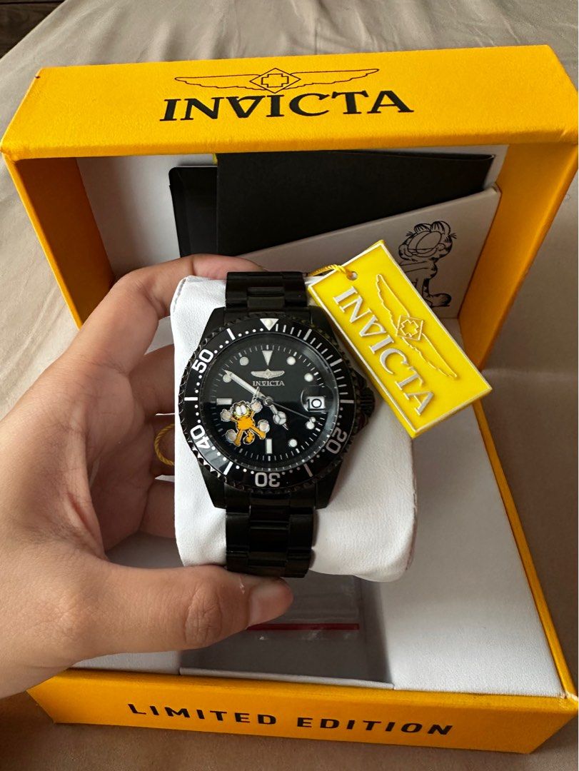 Invicta Character Collection Limited Edition Garfield (Category: Men's Watches) located in Manila. Submitted by alyssanico82773 (Listing ID 1379987819, Image 1). Description: ORGINAL Invicta Character Collection Limited Edition Garfield Black Dial Automatic Men’s Watch Complete Set with Box, Warranty, extra band links ₱5,000 with minor desk diver scratches message offers.