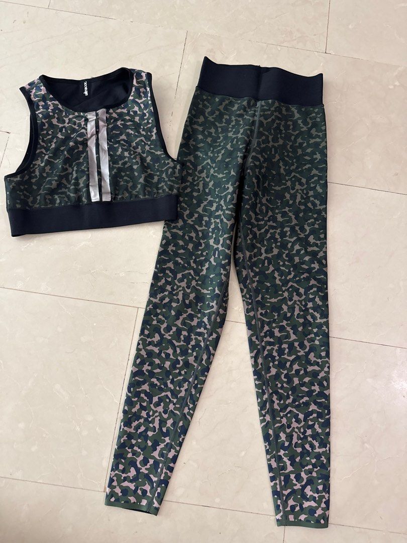 LIKE NEW. Ultracor Level Leo Camo Sports Bra and Leggings Set. More atas than lululemon and alo (Category: Activewear) located in Singapore. Submitted by pinkcandyfloss123 (Listing ID 1379972189, Image 3). Description: Ultracor Level Leo Camo sports bra and leggings set. Like new. Worn twice. Sports bra $39 Leggings - $69 Whole set - $99 This is a super premium athleisure brand; design is exclusive for Bergdorf Goodmans in the US. Brand more high