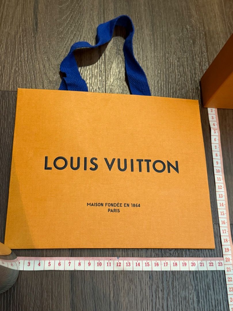 Louis Vuitton Paper Bags & Box (Category: Accessories) located in Singapore. Submitted by vanilla.twilights (Listing ID 1380074314, Image 2). Description: Louis Vuitton gift packaging, including various boxes and paper bags. Sizes vary, perfect for gifting or storage. Measurements in the photo in cm. paper bag 1st & 2nd : $5 each 3rd : $6 each 4th : $8 each 5th : $10 each box : $25 .