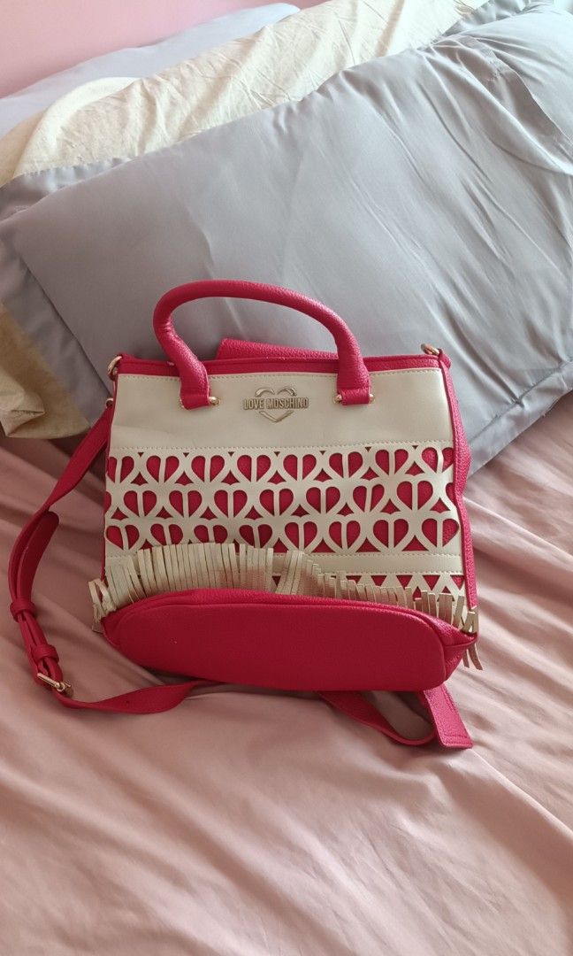 Moschino bag (Category: Luxury Bags & Wallets) located in Quezon City. Submitted by temmtem (Listing ID 1379955328, Image 1). Description: Bags for sale 300 for each 500 for both.